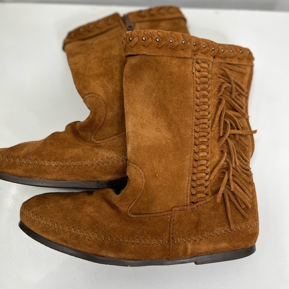 Brand new no box all suede fringed Minnetonka booties.